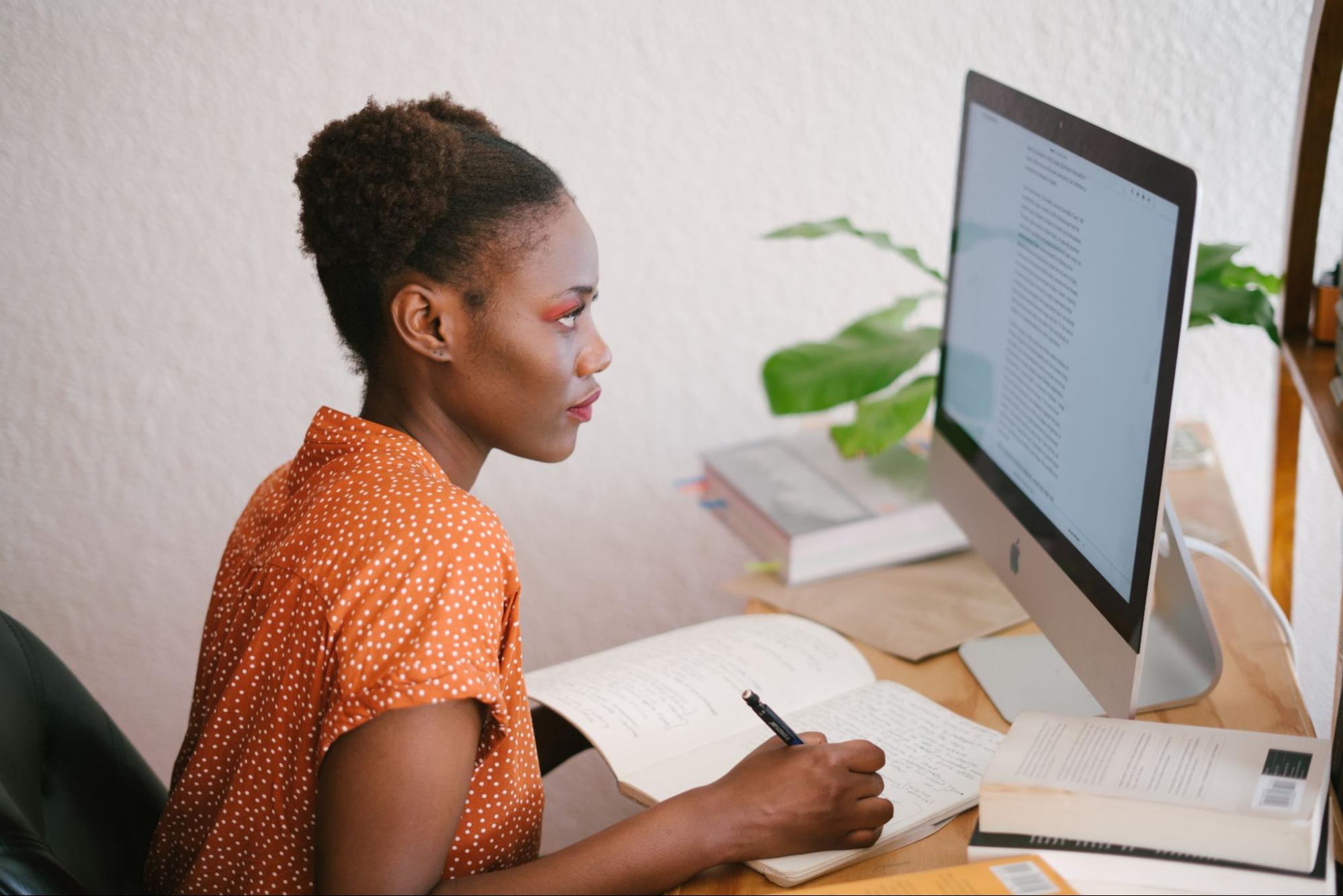 Photo of someone studying at a computer