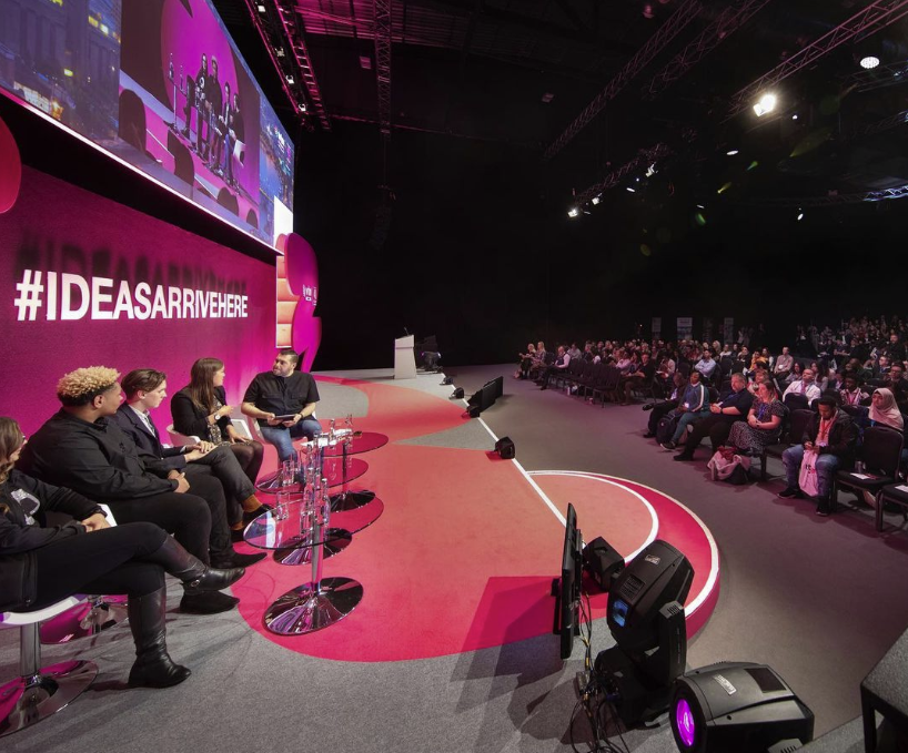 Photo of a talk at a conference