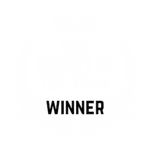 White laurel wreath badge on a black background reading "Global Agency Awards 2026 – SEO Agency of the Year – Winner".