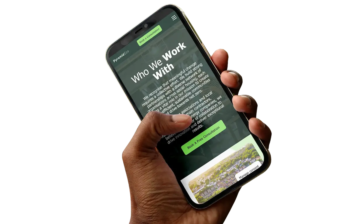 Hand holding a smartphone displaying the Pyramid Eco "Who We Work With" webpage describing their sustainable community partnerships and a "Book a Free Consultation" button