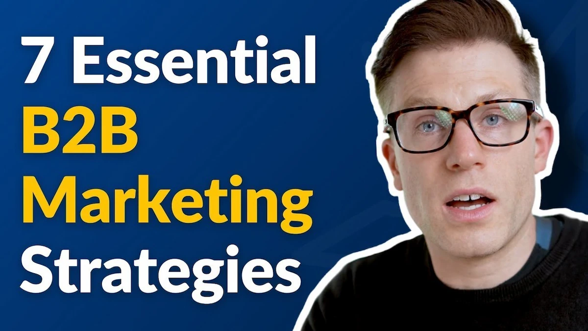 YouTube thumbnail titled "7 Essential B2B Marketing Strategies," featuring a man in glasses speaking against a dark blue background.